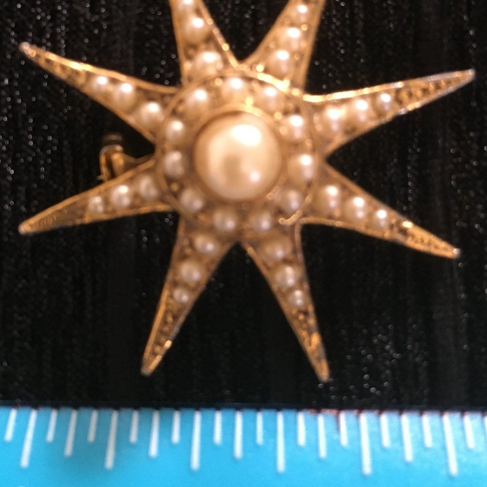 Starburst brooch with pearl accent, vintage avon